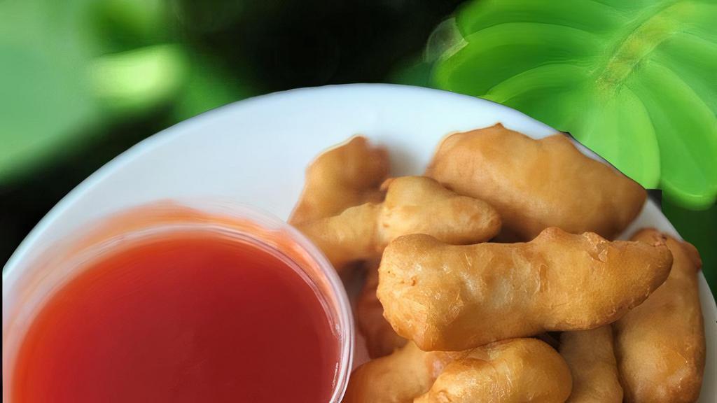 Sweet & Sour Chicken · Served with white rice or fried rice and egg roll.