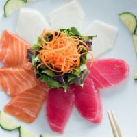 Sashimi Salad (Fish Of Your Choice) · Salmon, tuna, or white fish. Thin sliced with salad on the top w/ onion dressing, avocado, a...