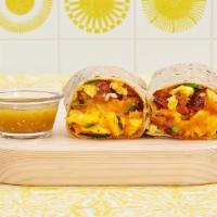 Spicy Hot Breakfast Burrito · Two scrambled eggs, jalapenos, breakfast potatoes, sriracha and melted cheese wrapped in a f...