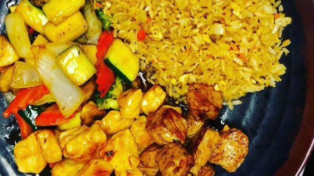 Hibachi Combo · Any (2) item Meats Or Seafood ,Served w.  Mix Vegetables ( Broccoli , Zucchini , Carrots ,Onion )Fried Riche,  Clear Soup & Salad w. House Special Dressing .