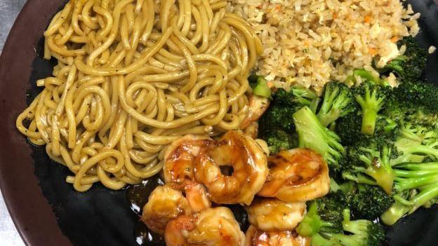 Hibachi Shrimp · Served w. Shrimp , Mix Vegetables ( Onion , Carrots , Broccoli ,Zucchini  ), Fried Rice , Clear Soup & Salad w. HOUSE Special Dressing.