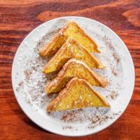 French Toast · Two slices of bread (regular or whole wheat) dipped in egg then grilled to perfection. Toppe...