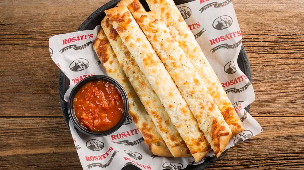 Cheesy Bread Stix · Breadsticks topped with garlic butter and mozzarella cheese and served with a side of marinara. 1310 Cal.