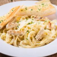 Fettuccine Alfredo With Crispy Chicken · Fettuccine noodles and crispy chicken tossed in a rich, creamy alfredo sauce made with Asiag...