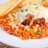 Chicken Parmigiana · Breaded chicken breast baked with marinara sauce topped with baked mozzarella cheese, shaved...