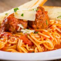 Spaghetti & Meatballs · Traditional spaghetti with marinara sauce served with homemade meatballs
from the family rec...