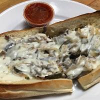 Steak Special Sub · Steak sub with mushrooms, onions, green peppers, mozzarella cheese and tomato sauce