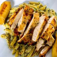 Grilled Chicken Alfredo  · This dish is so big it can feed 2 people. The pasta and sauce are lightly seasoned because o...