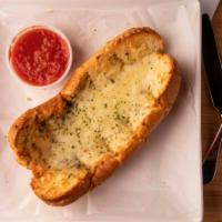 Cheesy Garlic Bread · Toasted garlic bread smothered with mozzarella cheese. Served with a side of marinara sauce.