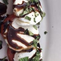 Caprese · Fresh mozzarella cheese and Roma tomatoes with balsamic drizzle dressing.