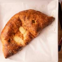 Cheese Calzone · Pizza Dough Pocket Filled with Seasoned Ricotta, Mozzarella and Parmesan Cheese, Served with...