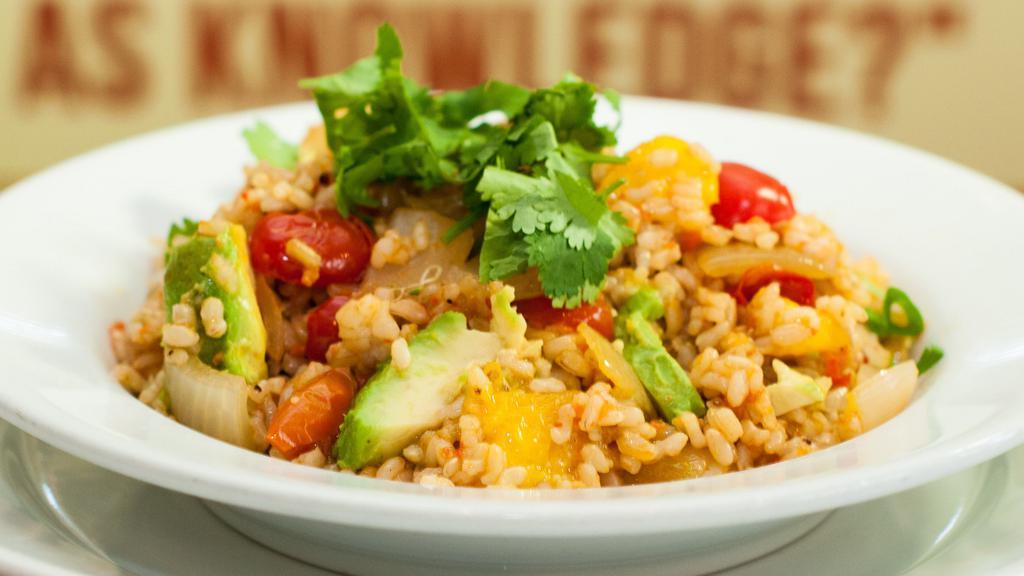 Fiesta Brown Rice · Vegan. Brown Rice,Avocado, mango, tomato, onion, cilantro, and brown rice with lime and red pepper sauce.