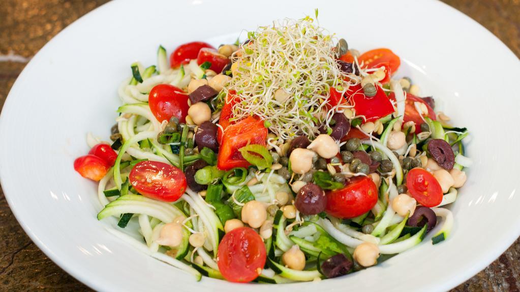 Raw Zucchini Puttanesca · Vegan. Zucchini spaghetti tossed with sprouted garbanzos, sprouted lentils, grape tomatoes, red peppers, kalamata olives, capers, and scallions in lemon garlic sauce.