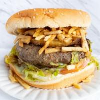 Hamburguesa Hawaiana · Ground Steak patty, tomato, lettuce, cheese, bacon strips, potato chip crumbs, ketchup,
pine...