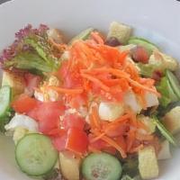 Garden · mixed greens, tomatoes, chopped egg, cucumbers, carrots, house-made croutons, choice of dres...