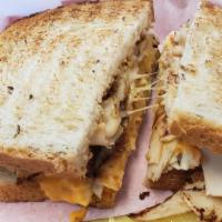 Turkey Rachel · Thinly sliced turkey breast, Swiss cheese and coleslaw served on toasted rye with Russian dr...