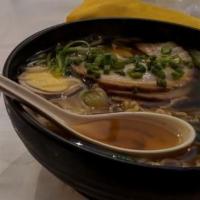 Shoyu Ramen · Japanese noodle, sliced pork, egg, ginger, onion, shoyu soup