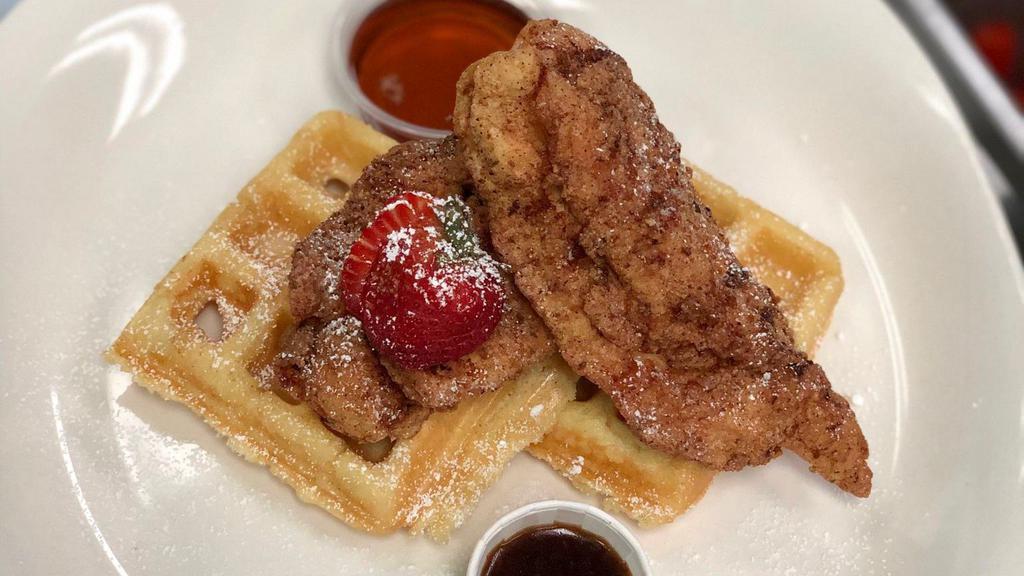 Chicken And Waffles · Fried chicken and waffles southern style with maple syrup