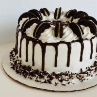 Mookie'S Cookies 'N' Cream Cake · 7-inch round cake, serves 10-12. Delicious cookies ‘n’ cream & vanilla froyo layers on a whi...