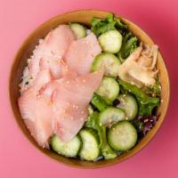 Red Snapper Rice Bowl · Freshly sliced red snapper sashimi over sushi rice with sliced cucumber, radish, ginger, cru...