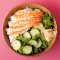 Shrimp Rice Bowl · Shrimp over sushi rice with sliced cucumber, radish, ginger, crunchy greens, and sesame seeds.