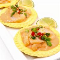 Patacones Con Camarones · 3 tostones with pink sauce covered shrimp