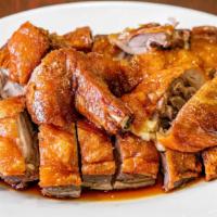 Roast Duck Cantonese Style · Customer favorite. Half long island duck roasted to a tender golden brown served with genuin...