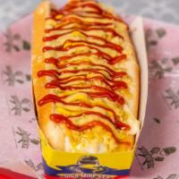 Perro Caliente · Beef hotdog, cheese, pineapple sauce, mustard, mayonnaise, ketchup and our signature sauce a...