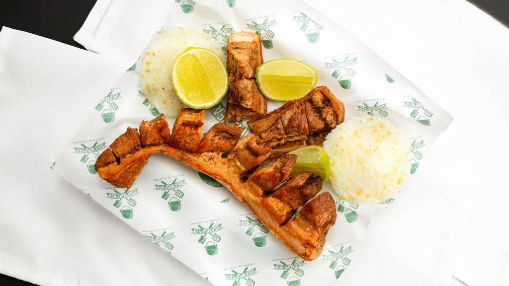Chicharron · Pork belly with a side of plantain or arepa or yuca.
