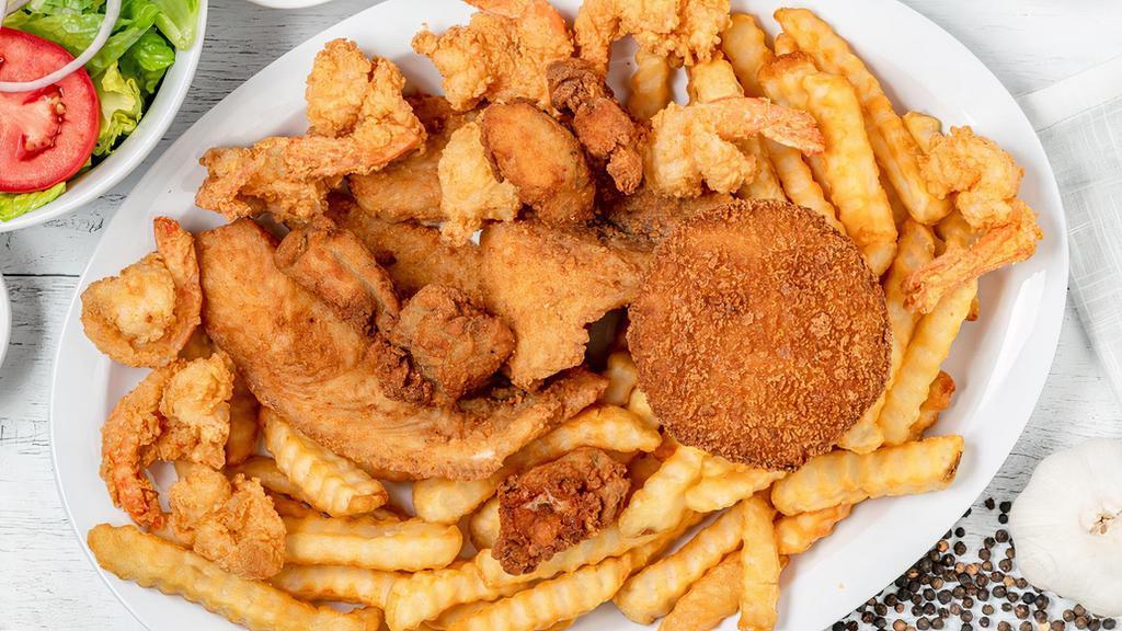 Seafood Select · Select: 1 piece fish and 10 pieces shrimp and six pieces oysters and crabcake.
Fish : Basa or Tilapia

comes with two sides 
F.fries, salad, or rice &bean