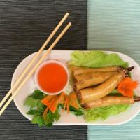 Ap18. Thai Shrimp Rolls · Fried shrimp wrapped in spring roll skin and served with new sweet and sour sauce (5 pieces)