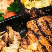 Mediterranean Chicken Dinner · Marinated and char-grilled mediterranean chicken breast w/ grilled zucchini,  grilled mushro...