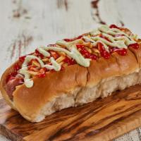 Perro Caliente / Hot Dog · Salchicha, repollo, papas ralladas, salsa roja y tártara. / Sausage, cabbage, shredded potat...