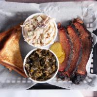 Brisket Plate · Low, slow, hickory-smoked, sliced beef brisket served with two sides and texas toast.