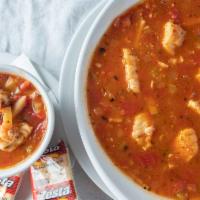 Bahamian Fish Chowder · An island-style favorite loaded with white fish, fire roasted tomatoes and potatoes. Contain...