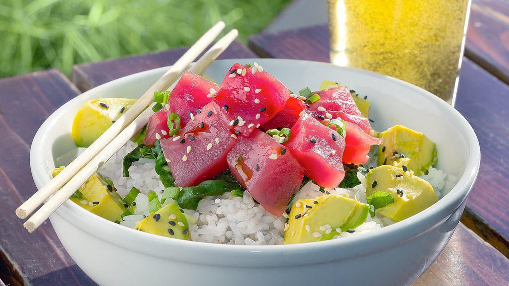 Caliche'S Poke Bowl · Straight from wishbones in playa jaco, fresh sushi grade ahi tuna seasoned with caliche's secret marinade. Served with steamed spinach over sticky rice. Finished with diced avocados, green onions and sesame seeds. Pura Vida!.