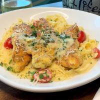 Pan-Seared Chicken Pasta · Pan seared, panko-breaded chicken with a lemon-caper butter sauce. Served with fettuccine an...