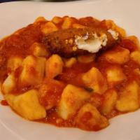 Sofia'S Gnocchi · House made potato dumplings served with pomodoro sauce and topped with fried mozzarella.