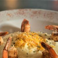 Shrimp & Grits  · Blackened Shrimp served over a bowl of Grits with cheddar cheese