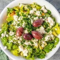 Greek Salad · Chopped tomatoes, cucumber, parsley, romaine lettuce, feta cheese, Kalamata olives and house...