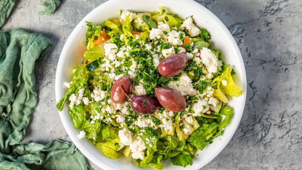 Greek Salad · Chopped tomatoes, cucumber, parsley, romaine lettuce, feta cheese, Kalamata olives and house dressing.