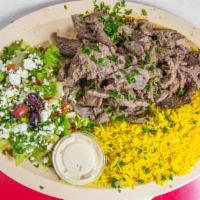 Beef Shawarma Platter · Thin sliced beef top sirloin marinated overnight with middle eastern spices.