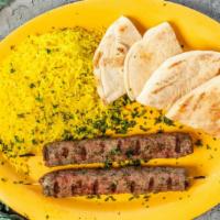 Kafta Kabbob · 2 ground beef and ground lean lamb skewers mixed with onions, parsley and our own spice.