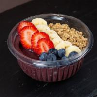 Pitaya Bowl · Pitaya sorbet with blueberries, strawberries, banana and granola.