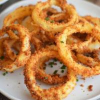 Onion Rings · Battered and deep fried onion rings.