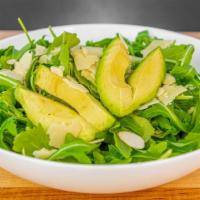 Arugula Salad · Arugula with shaved parmesan, pine nuts and avocado with a citrus vinaigrette.