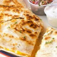 Quesadillas · Quesadillas - soft flour tortilla filled with your choice of meat and Mexican cheese served ...