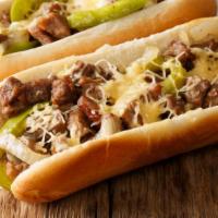 Famous Philly Cheesesteak A La Carte · Prime thinly sliced us beef is cooked to perfection and served on a hot oven-toasted roll. W...