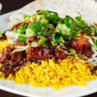 Oriental · Teriyaki chicken served over yellow rice, lettuce, tomatoes, scallions, sesame seeds, with p...