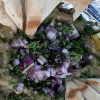 Baba Ganoush · Roasted eggplant, garlic, tahini, olive oil.